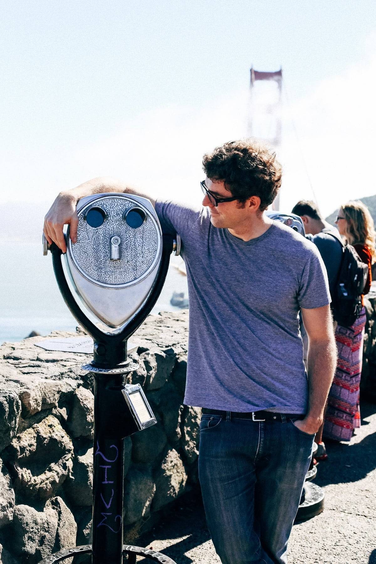 Man leaning and smiling.