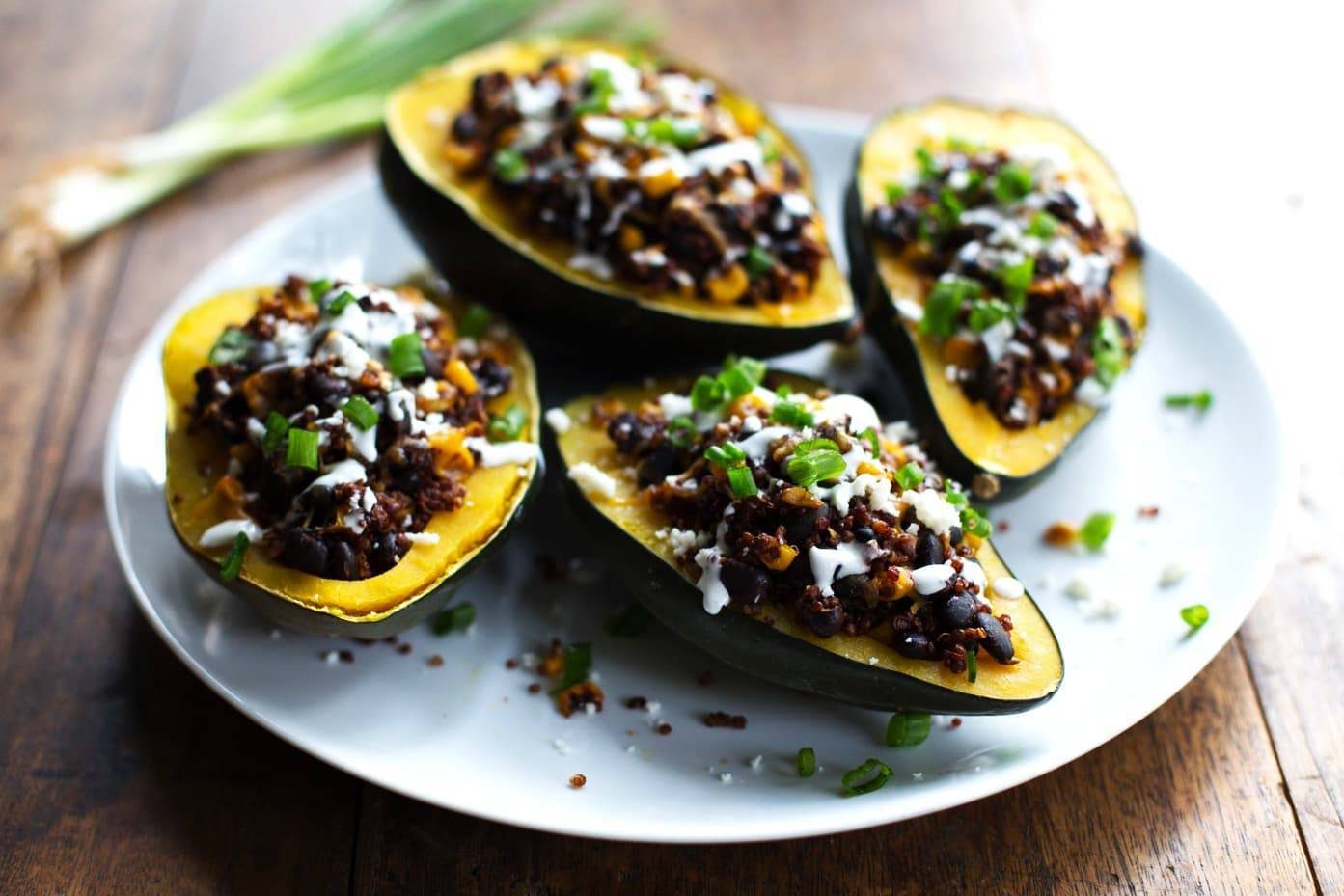 Mexican Roasted Corn and Quinoa Stuffed Squash on a plate.