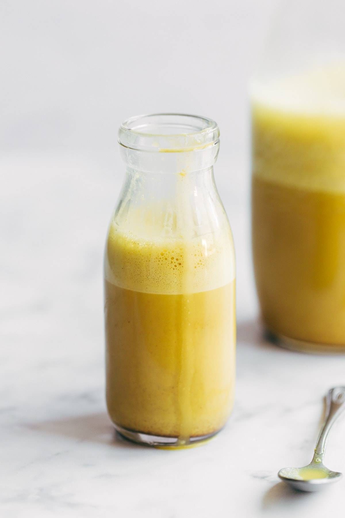 Golden milk latte in a jar.